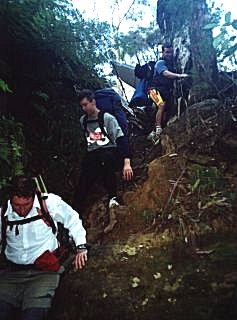 scrambling down into the canyon