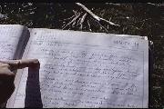 Geoff scans the visitors book. Dissapointment Spur Hut